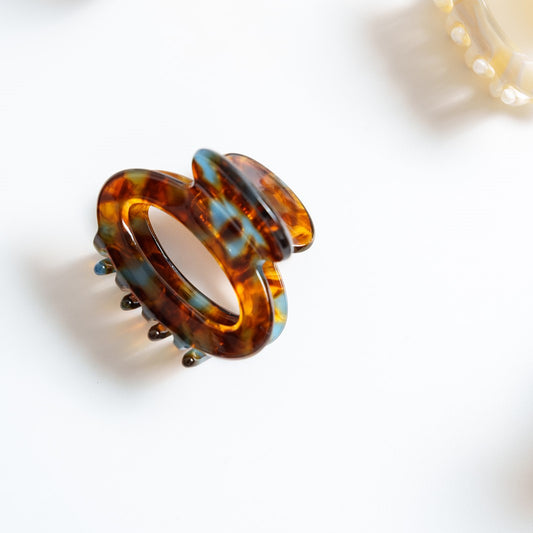 Kleine ronde haarspeld fijn haar stevig knijpt goed glad haar bruin blauw