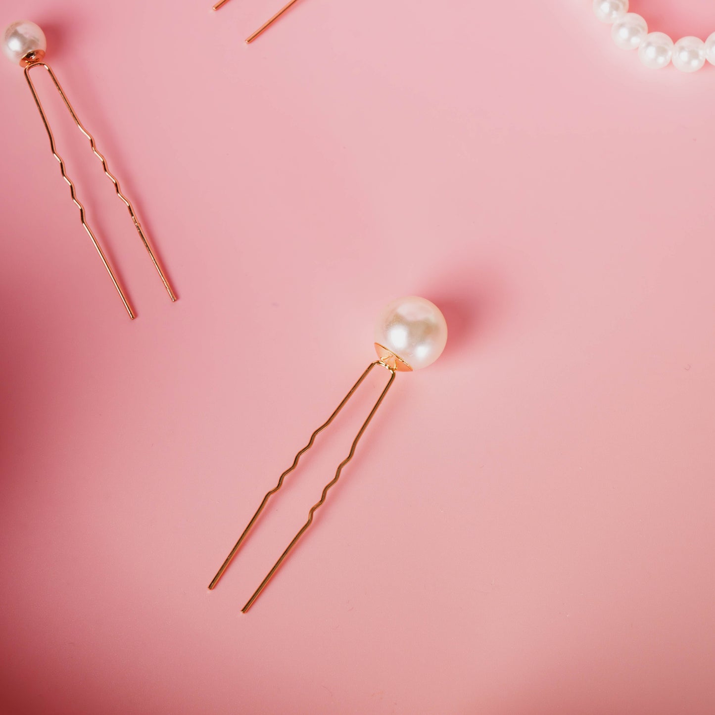 Pixie pin metalen gouden pin witte parel fijn haar opsteek kapsel